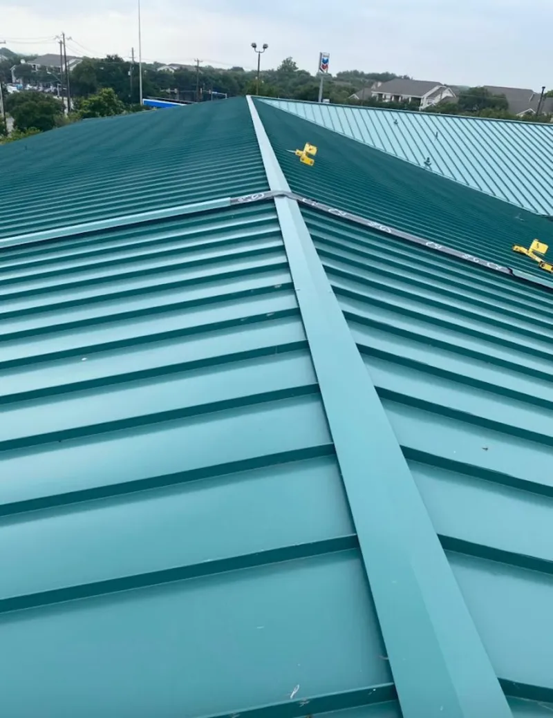 Green commercial metal roof ridge and valley for Metal Roof Repair in Rowlett