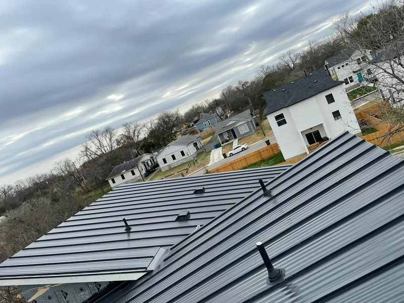 Standing seam metal roof panels with vents for Skylight Repair in Rowlett